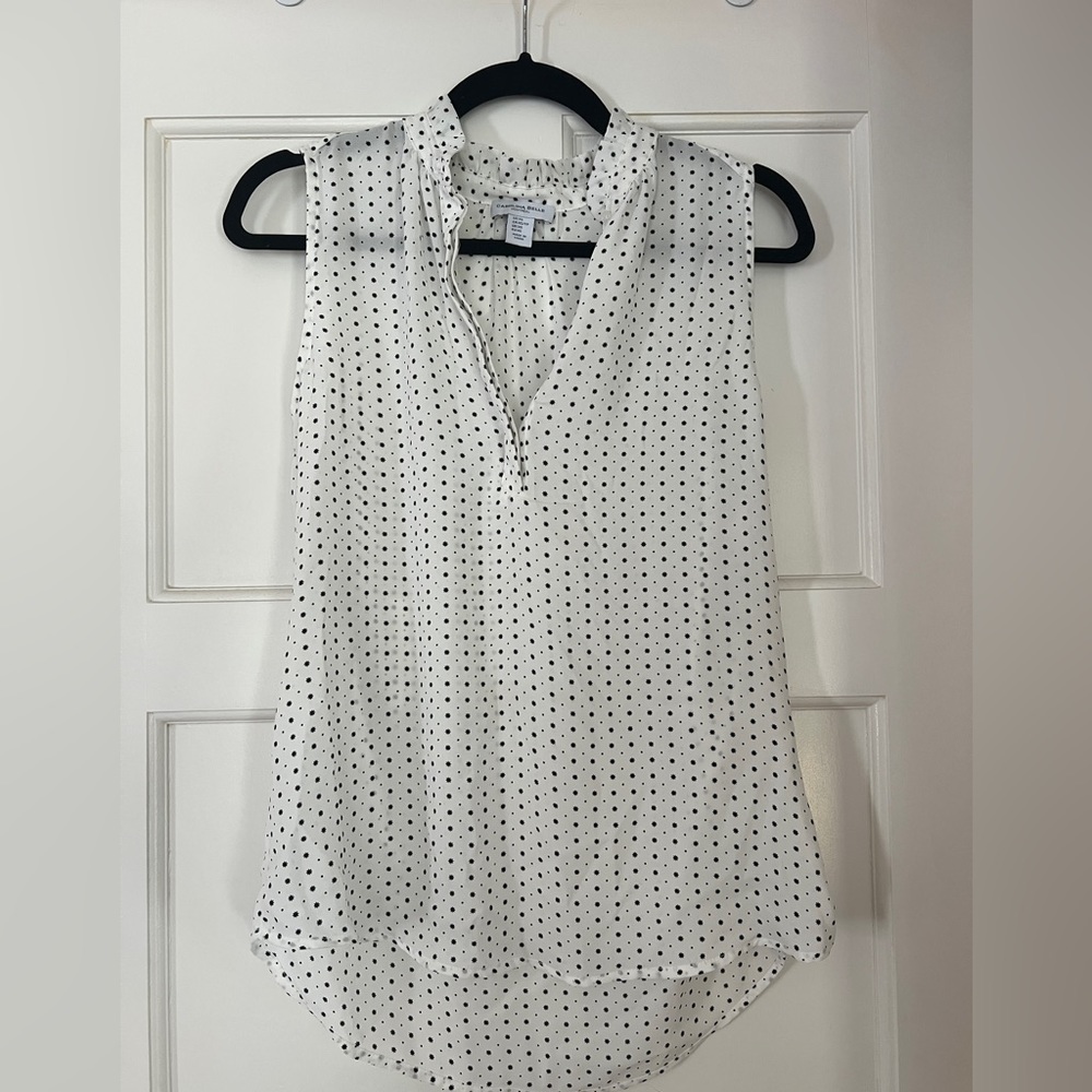 White sleeveless blouse